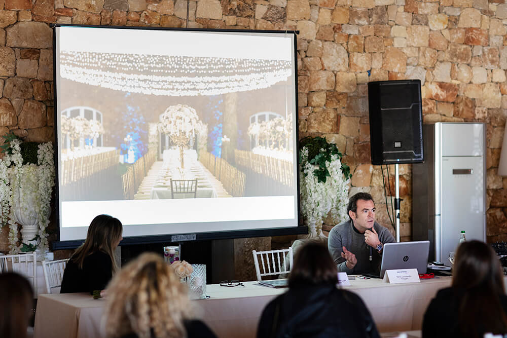 Trapaese photographer Nino Lombardo at the conference with the wedding planners in Sicily