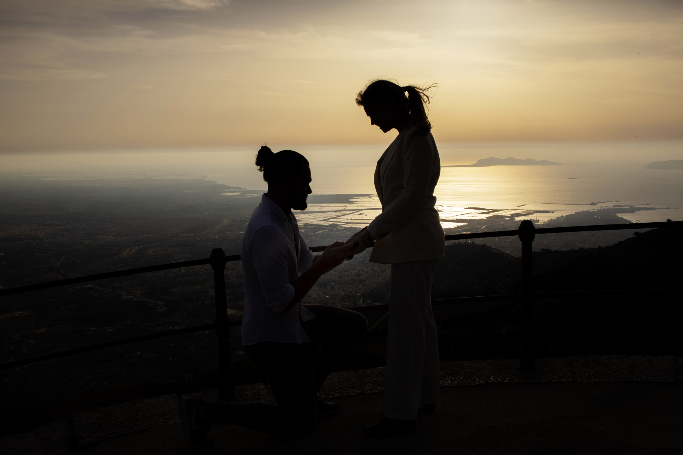 Photo for a surprise marriage proposal in Erice with a view of the Egadi